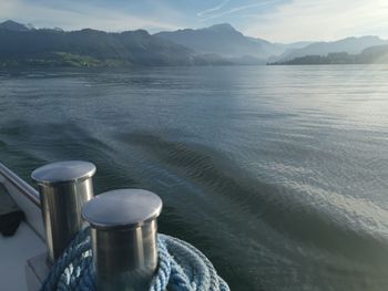 High angle view of coffee by sea against sky