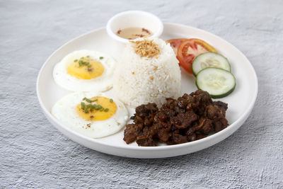 High angle view of food in plate on table