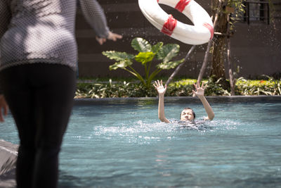 People swimming in pool