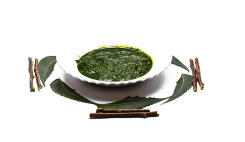 Close-up of fresh vegetables against white background