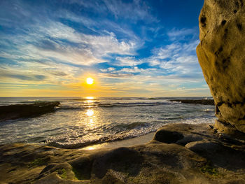 Scenic view of sea against sky during sunset