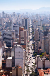 High angle view of buildings in city against sky