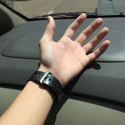 Close-up of hand holding car