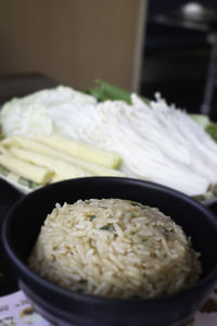 Close-up of rice in bowl on table