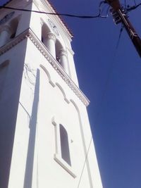 Low angle view of mosque against clear sky