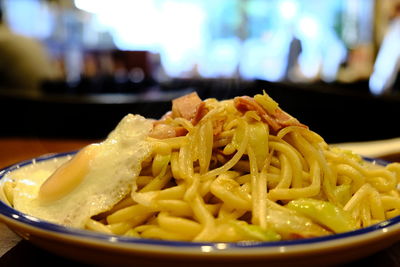 Close-up of pasta in plate on table