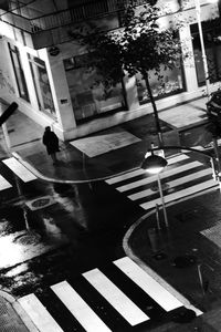 High angle view of person walking on street