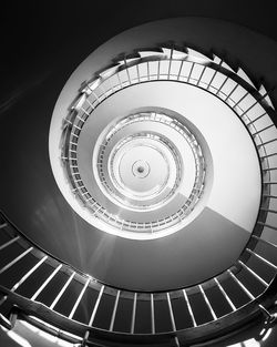 Directly below shot of spiral staircase in building