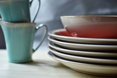 Close-up of dinnerware on table