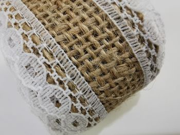 Close-up portrait of a ribbon roll made of weaved hay