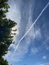 Low angle view of vapor trail in sky