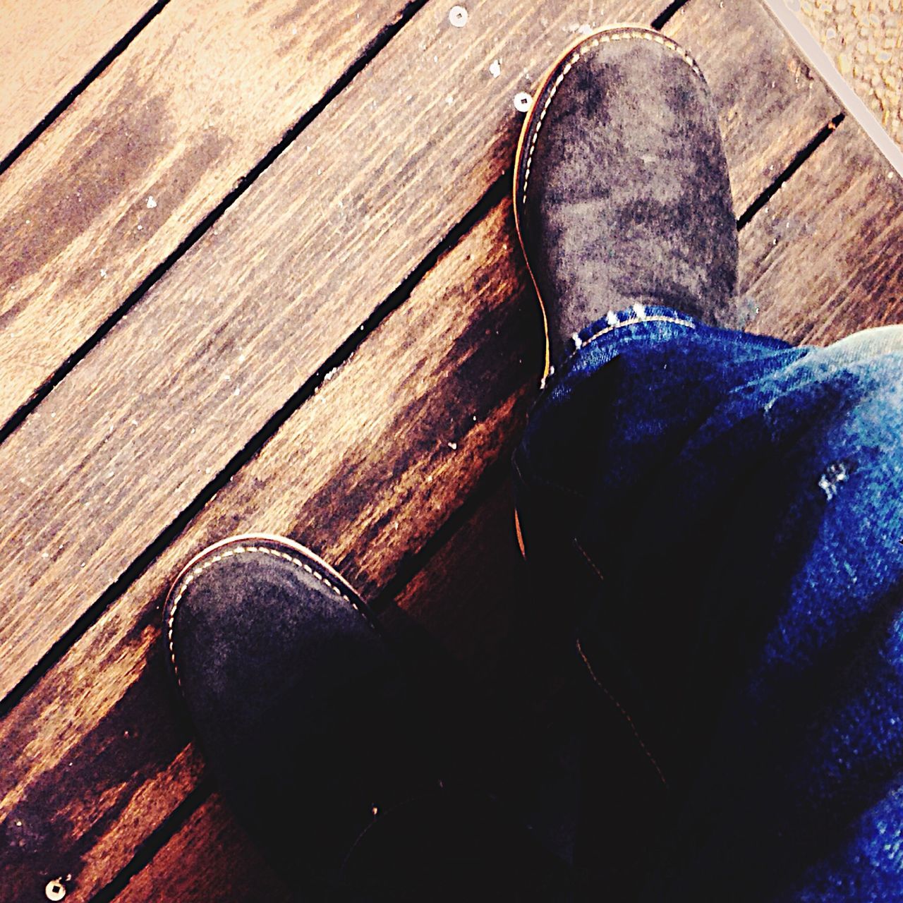 shoe, high angle view, wood - material, indoors, low section, wooden, footwear, still life, person, close-up, hardwood floor, table, pair, directly above, jeans, flooring, plank, wood, fashion, black color