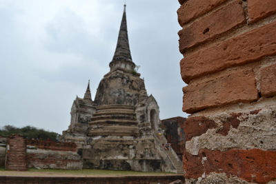 Low angle view of old building against sky