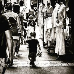 Woman standing on city street