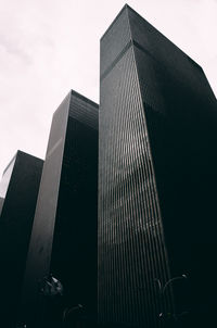 Low angle view of modern buildings against sky