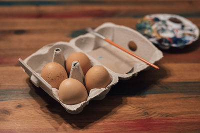 Eggs in an egg carton ready for painting easter decorations
