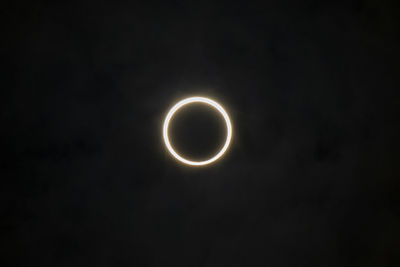 Low angle view of moon against sky at night