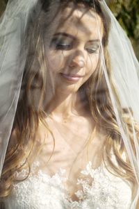 Portrait of a smiling young woman in wedding dress