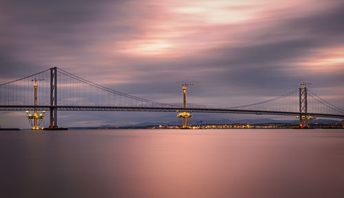 View of suspension bridge at sunset