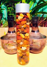 Close-up of multi colored glass jar