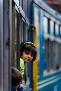 Close-up of boy in train