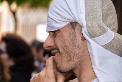 Close-up portrait of man wearing hat