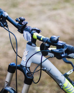 Close-up of bicycle on road