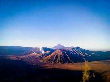 Scenic view of mountain range against clear sky