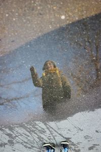 Reflection of person in water