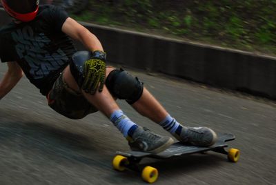 Man playing with skateboard