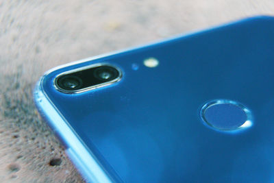 High angle view of smart phone on table