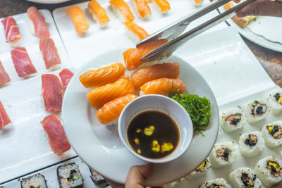 High angle view of serving food in plate on table