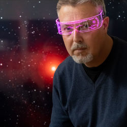 Portrait of man wearing eyeglasses