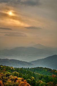 Scenic view of landscape against sky during sunset