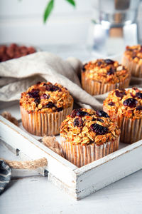 Fresh homemade oatmeal muffins with dried cranberry. healthy gluten free dessert. close-up.