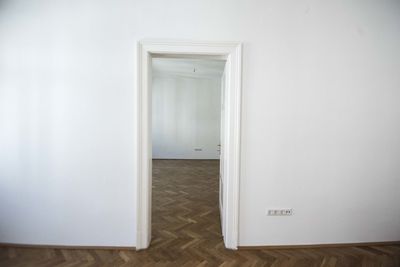 An empty living room, lounge room or sitting room in an apartment