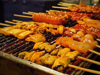 Close-up of meat on barbecue grill