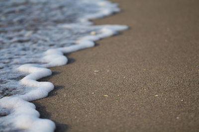 Sandy beach with waters edge