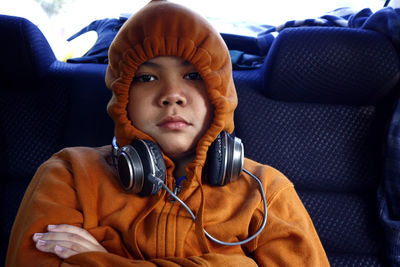 Portrait of boy sitting in car