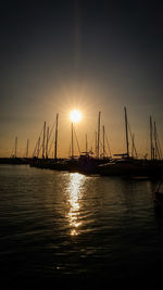 Silhouette of marina at sunset