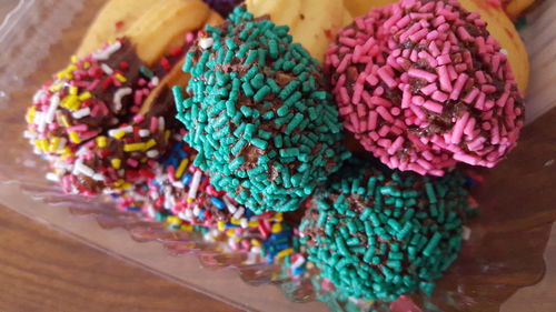 Close-up of multi colored candies on table