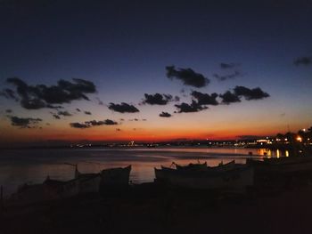 Scenic view of sea against sky at sunset