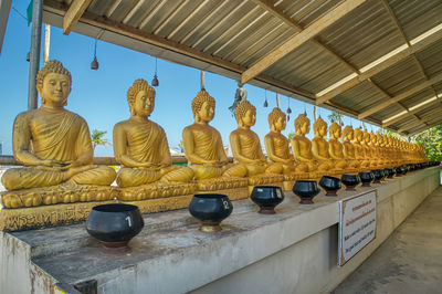 Statue of temple outside building