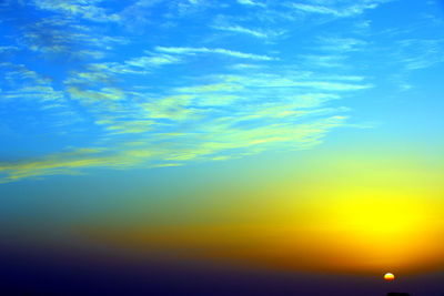 Low angle view of dramatic sky during sunset