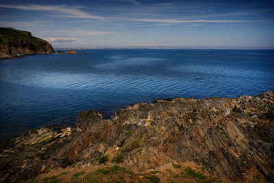 View of calm blue sea against sky