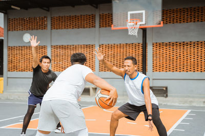 People playing basketball