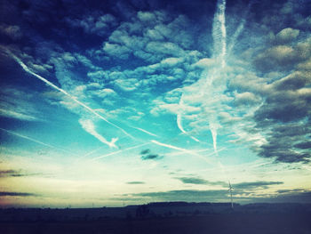 Scenic view of landscape against blue sky