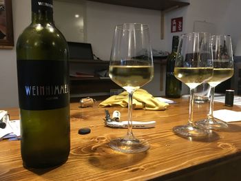 Close-up of wine bottles on table