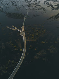 High angle view of motorcycle on land against sky