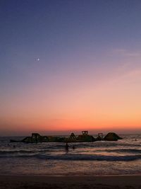 Scenic view of sea at sunset